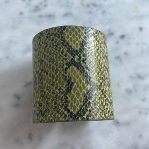 Chic snakeskin cuff with green and black.
